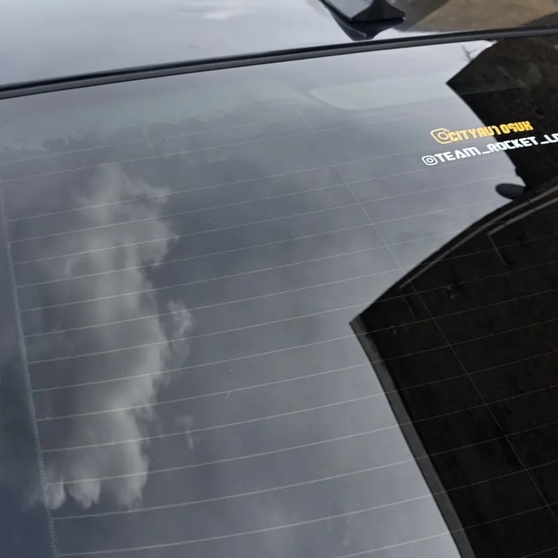 Glossy roof and crystal clear glass after a decontamination wash in North London