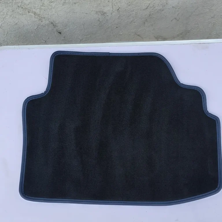 Floor mat deep cleaned and restored to black by PureShine