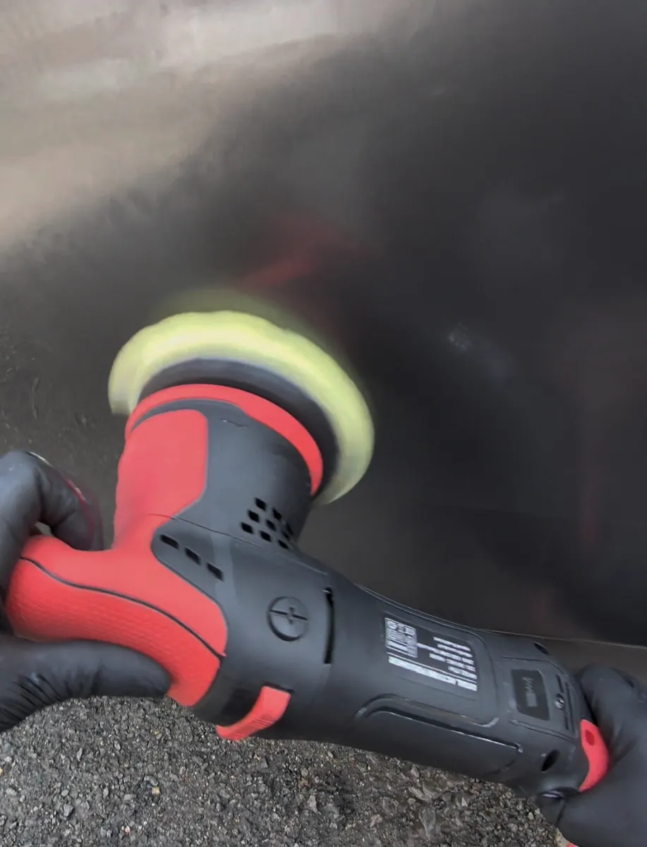 Dual action polisher correcting paintwork in NW London