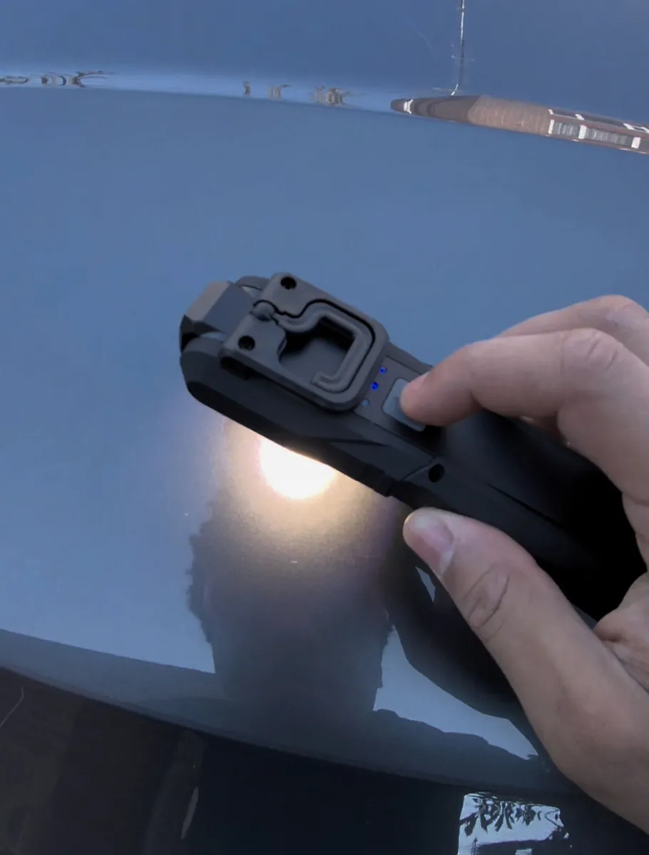 Inspecting paintwork for swirl marks with a detailing light