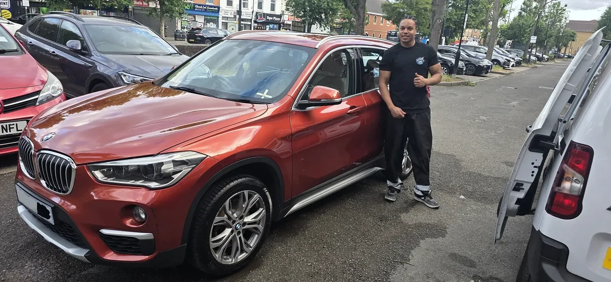 PureShine detailer beside a freshly cleaned car in NW London