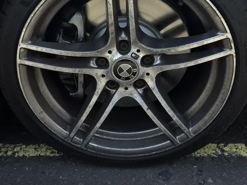 Alloy wheel cleaning during car detailing in NW London