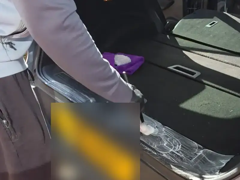 Boot sill being cleaned during a mobile car valet in Harrow