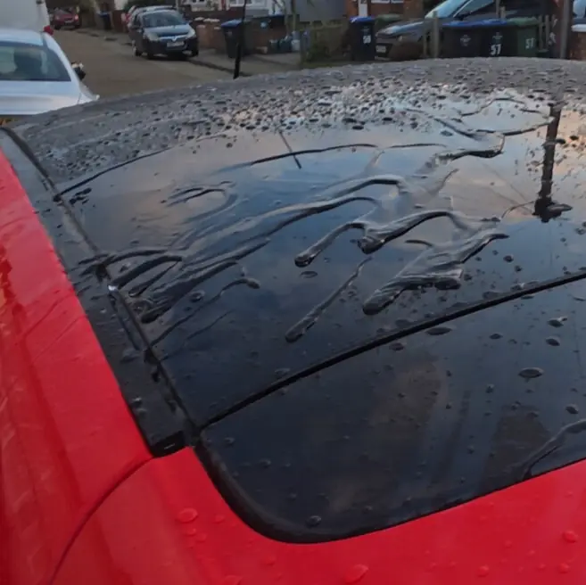 Ceramic spray coating applied to a car roof in Wembley