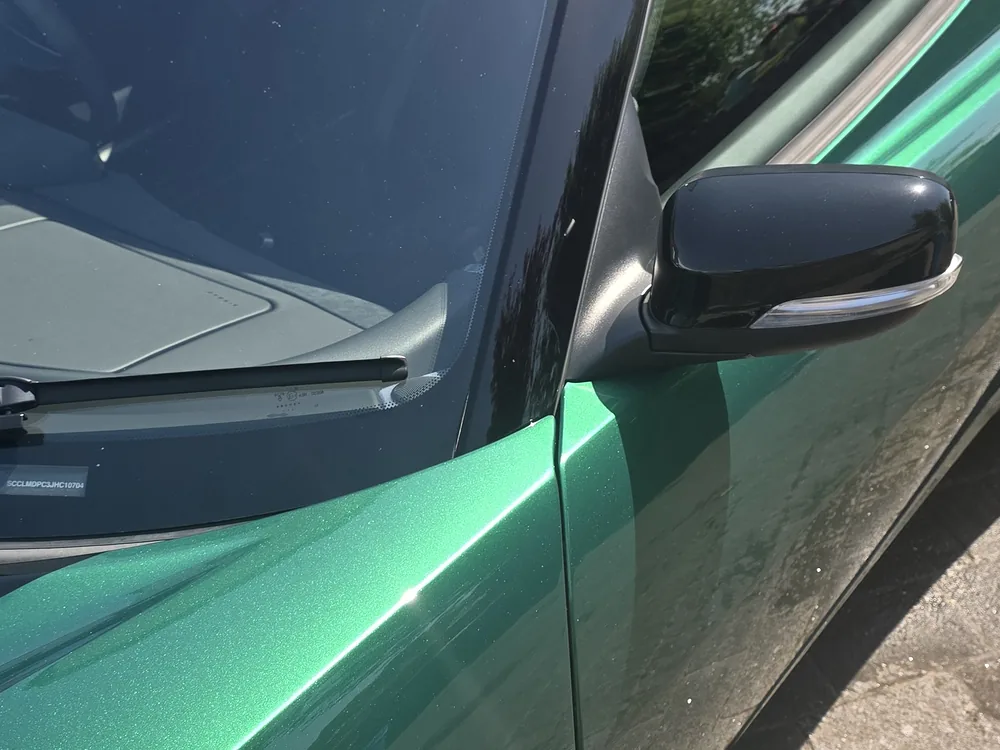 Car detailing Willesden — close up of corrected paint with sharp reflections