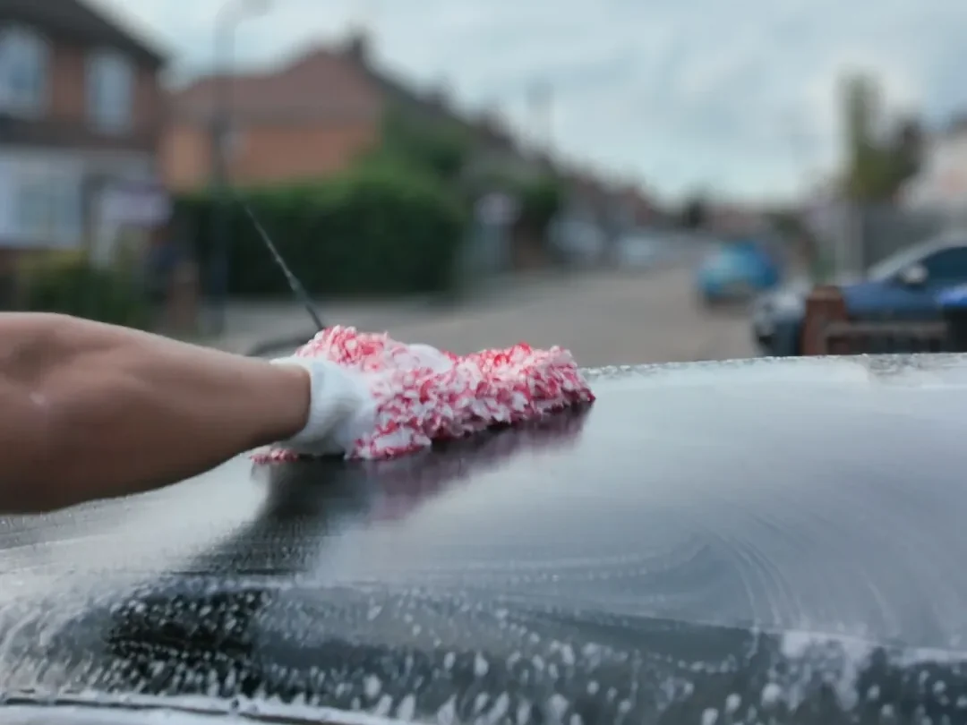Car detailing Kingsbury — safe hand wash on a car in NW9